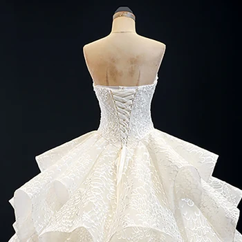 J66891 jancember balts strapless kāzu kleita bez piedurknēm mežģīnes augšu atpakaļ bumbu kleita daudzpakāpju plisēt kleitu elegants свадебные платья